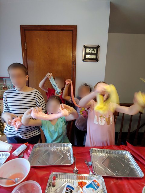 Party guests showing off their colorful glacier goo.