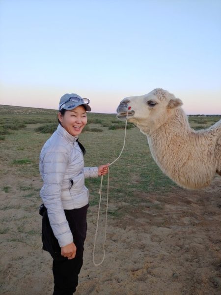 Tour guide and camel in the Little Gobi Desert.