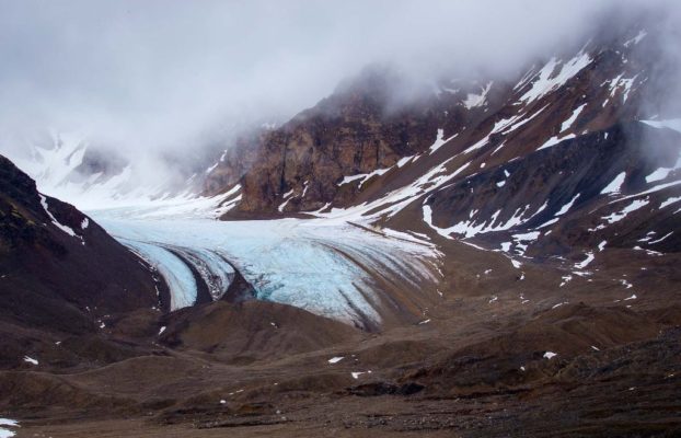 A Glacier and Terminal Moraine at Tinayrebukta