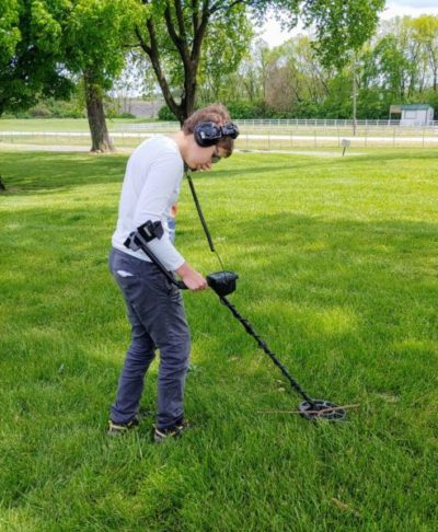 Boy Metal Detecting